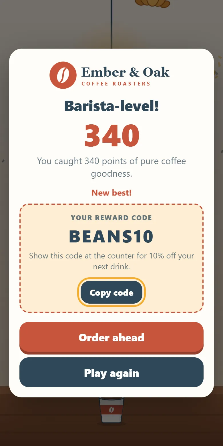Bean Drop game win screen with a coupon code on a phone